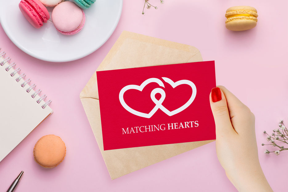 Free Valentines Greeting Card in Girl Hand Mockup.jpg