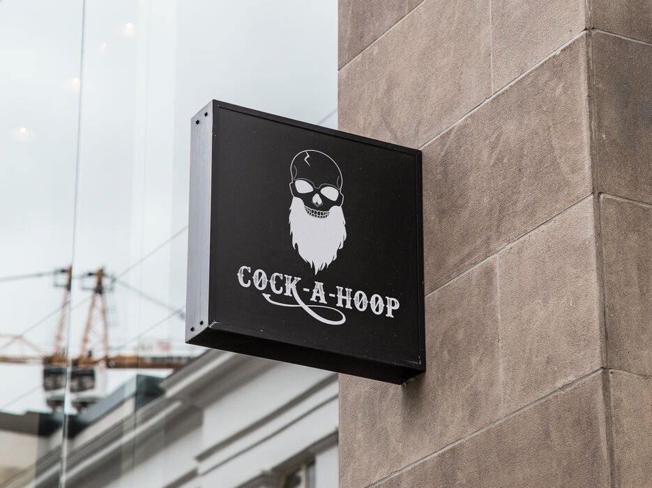 Hanging Wall Sign MockUp 4.jpg