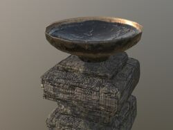 Stone with oil vase