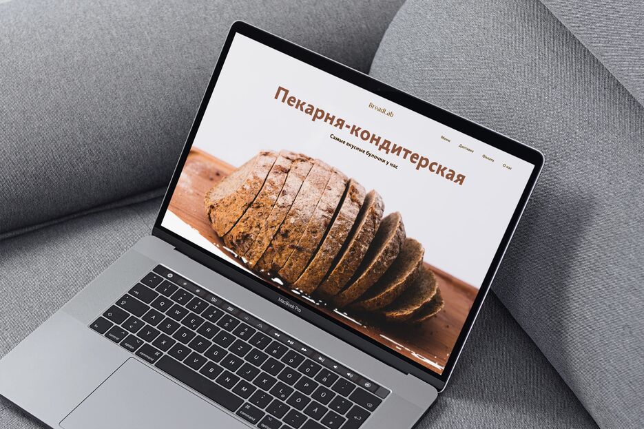 MacBook Pro Mockup on the couch.png