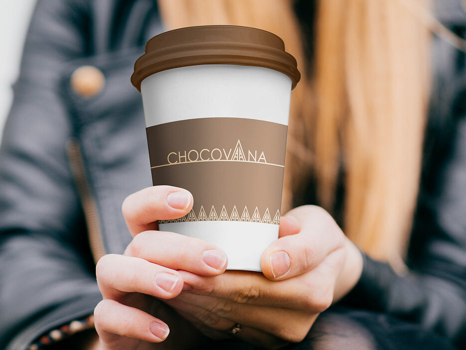 Free Paper Coffee Cup in hand Mockup PSDS.jpg