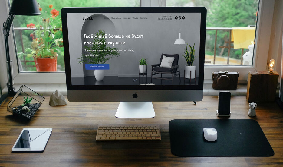 mockDrop_iMac in front of a window.jpg