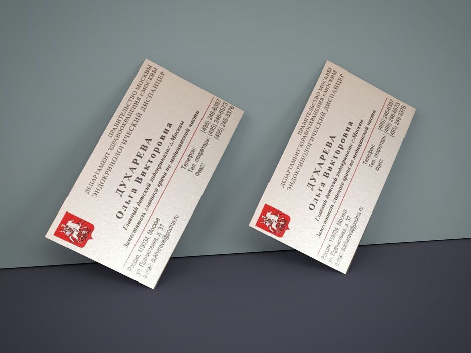 business-cards-on-wall-mockup.png